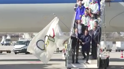 Milano Cortina 2026, la bandiera olimpica arriva in Italia
