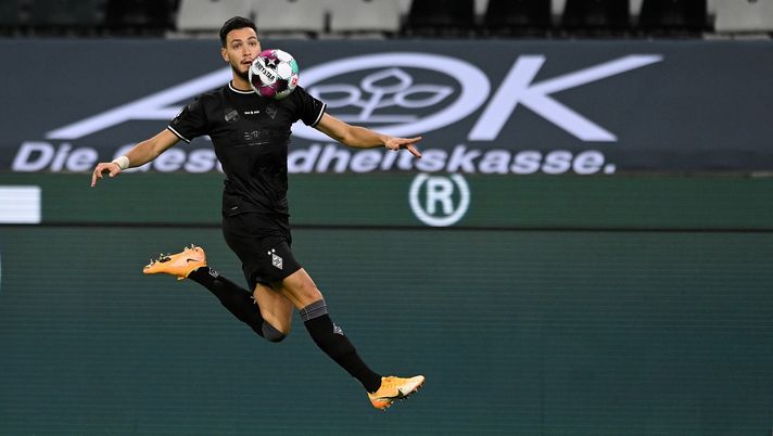 MOENCHENGLADBACH, GERMANY - OCTOBER 31: Moenchengladbach's Ramy Bensebaini in action during the Bundesliga match between Borussia Moenchengladbach and RB Leipzig at Borussia-Park on October 31, 2020 in Moenchengladbach, Germany. (Photo by Sascha Steinbach - Pool/Getty Images) 