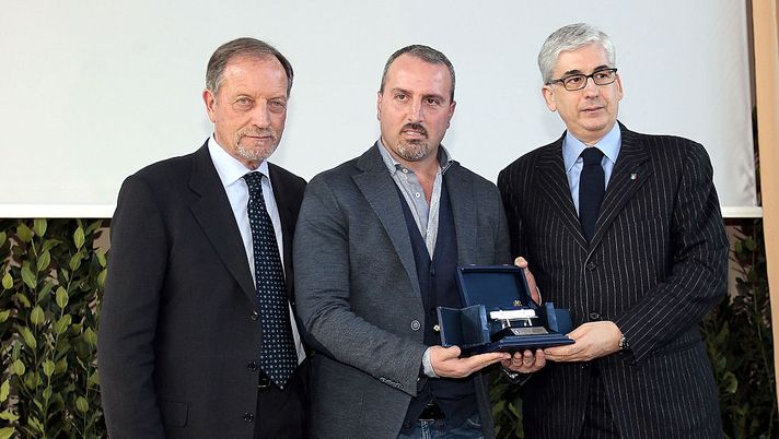 FLORENCE, ITALY - MARCH 09: Renzo Ulivieri President National Association coaches (L) , Mario Petrone manager of Bassano Calcio (C) during the "Panchina D'oro season 2013-2014" on March 9, 2015 in Florence, Italy.  (Photo by Gabriele Maltinti/Getty Images) 