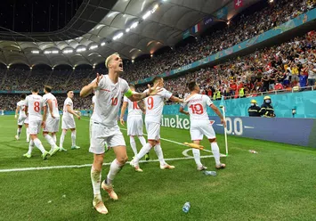 BUCHAREST, ROMANIA - JUNE 28: Granit Xhaka of Switzerland celebrates their side's third goal scored by team mate Mario Gavranovic during the UEFA Euro 2020 Championship Round of 16 match between France and Switzerland at National Arena on June 28, 2021 in Bucharest, Romania. (Photo by Justin Setterfield/Getty Images)