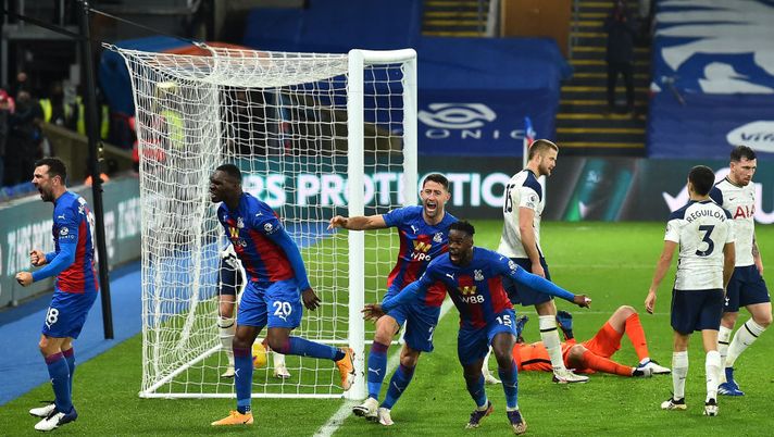 LONDON, ENGLAND - DECEMBER 13: Jeffrey Schlupp of Crystal Palace celebrates with Gary Cahill and Christian Benteke after scoring their team's first goal during the Premier League match between Crystal Palace and Tottenham Hotspur at Selhurst Park on December 13, 2020 in London, England. A limited number of spectators (2000) are welcomed back to stadiums to watch elite football across England. This was following easing of restrictions on spectators in tiers one and two areas only. (Photo by Glyn Kirk - Pool/Getty Images) LONDON, ENGLAND - DECEMBER 13: Jeffrey Schlupp of Crystal Palace celebrates with Gary Cahill and Christian Benteke after scoring their team's first goal during the Premier League match between Crystal Palace and Tottenham Hotspur at Selhurst Park on December 13, 2020 in London, England. A limited number of spectators (2000) are welcomed back to stadiums to watch elite football across England. This was following easing of restrictions on spectators in tiers one and two areas only. (Photo by Glyn Kirk - Pool/Getty Images)