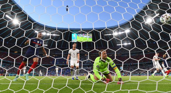 MUNICH, GERMANY - JUNE 15: Mats Hummels of Germany looks dejected after scoring an own goal past team mate Manuel Neuer as Kylian Mbappe of France celebrates during the UEFA Euro 2020 Championship Group F match between France and Germany at Football Arena Munich on June 15, 2021 in Munich, Germany. (Photo by Matthias Hangst/Getty Images) MUNICH, GERMANY - JUNE 15: Mats Hummels of Germany looks dejected after scoring an own goal past team mate Manuel Neuer as Kylian Mbappe of France celebrates during the UEFA Euro 2020 Championship Group F match between France and Germany at Football Arena Munich on June 15, 2021 in Munich, Germany. (Photo by Matthias Hangst/Getty Images)