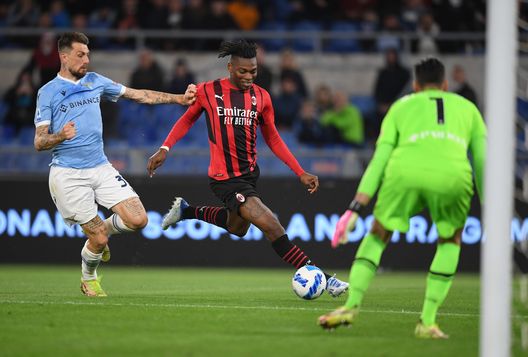 ROME, ITALY - APRIL 24: Rafael Leao of AC Milan competes for the ball with Francesco Acerbi of SS Lazio during the Serie A match between SS Lazio and AC Milan at Stadio Olimpico on April 24, 2022 in Rome, Italy. (Photo by Claudio Villa/AC Milan via Getty Images)