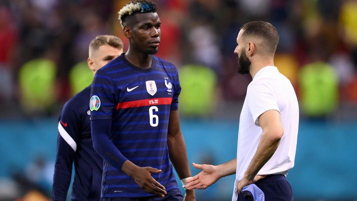 BUCHAREST, ROMANIA - JUNE 28: Paul Pogba of France looks dejected as he interacts with team mate Karim Benzema after the UEFA Euro 2020 Championship Round of 16 match between France and Switzerland at National Arena on June 28, 2021 in Bucharest, Romania. (Photo by Daniel Mihailescu - Pool/Getty Images) BUCHAREST, ROMANIA - JUNE 28: Paul Pogba of France looks dejected as he interacts with team mate Karim Benzema after the UEFA Euro 2020 Championship Round of 16 match between France and Switzerland at National Arena on June 28, 2021 in Bucharest, Romania. (Photo by Daniel Mihailescu - Pool/Getty Images)