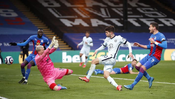 LONDON, ENGLAND - APRIL 10: Christian Pulisic of Chelsea scores their team's fourth goal past Vicente Guaita of Crystal Palace during the Premier League match between Crystal Palace and Chelsea at Selhurst Park on April 10, 2021 in London, England. Sporting stadiums around the UK remain under strict restrictions due to the Coronavirus Pandemic as Government social distancing laws prohibit fans inside venues resulting in games being played behind closed doors. (Photo by Peter Cziborra - Pool/Getty Images) LONDON, ENGLAND - APRIL 10: Christian Pulisic of Chelsea scores their team's fourth goal past Vicente Guaita of Crystal Palace during the Premier League match between Crystal Palace and Chelsea at Selhurst Park on April 10, 2021 in London, England. Sporting stadiums around the UK remain under strict restrictions due to the Coronavirus Pandemic as Government social distancing laws prohibit fans inside venues resulting in games being played behind closed doors. (Photo by Peter Cziborra - Pool/Getty Images)