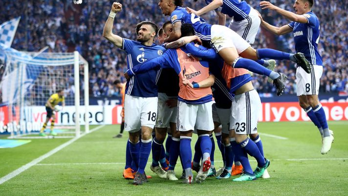 GELSENKIRCHEN, GERMANY - APRIL 15: Yevhen Konoplyanka of Schalke celebrate with his team mates after he scores the opening goal during the Bundesliga match between FC Schalke 04 and Borussia Dortmund at Veltins-Arena on April 15, 2018 in Gelsenkirchen, Germany. (Photo by Alex Grimm/Bongarts/Getty Images) GELSENKIRCHEN, GERMANY - APRIL 15: Yevhen Konoplyanka of Schalke celebrate with his team mates after he scores the opening goal during the Bundesliga match between FC Schalke 04 and Borussia Dortmund at Veltins-Arena on April 15, 2018 in Gelsenkirchen, Germany. (Photo by Alex Grimm/Bongarts/Getty Images)