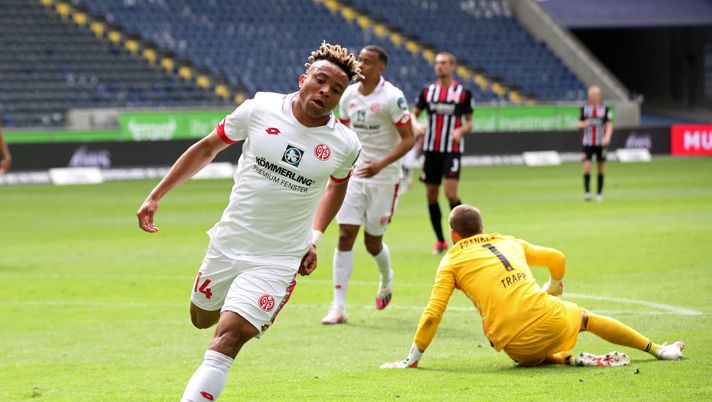 FRANKFURT AM MAIN, GERMANY - JUNE 06: Pierre Kunde Malong of 1. FSV Mainz 05 celebrates after scoring his team's second goal during the Bundesliga match between Eintracht Frankfurt and 1. FSV Mainz 05 at Commerzbank-Arena on June 06, 2020 in Frankfurt am Main, Germany. (Photo by Alexander Hassenstein/Getty Images) FRANKFURT AM MAIN, GERMANY - JUNE 06: Pierre Kunde Malong of 1. FSV Mainz 05 celebrates after scoring his team's second goal during the Bundesliga match between Eintracht Frankfurt and 1. FSV Mainz 05 at Commerzbank-Arena on June 06, 2020 in Frankfurt am Main, Germany. (Photo by Alexander Hassenstein/Getty Images)