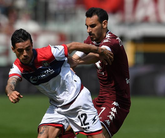 TURIN, ITALY - APRIL 15: Adrian Marius Stoian (L) of FC Crotone is challenged by Davide Zappacostaof FC Torino during the Serie A match between FC Torino and FC Crotone at Stadio Olimpico di Torino on April 15, 2017 in Turin, Italy. (Photo by Valerio Pennicino/Getty Images) TURIN, ITALY - APRIL 15: Adrian Marius Stoian (L) of FC Crotone is challenged by Davide Zappacostaof FC Torino during the Serie A match between FC Torino and FC Crotone at Stadio Olimpico di Torino on April 15, 2017 in Turin, Italy. (Photo by Valerio Pennicino/Getty Images)