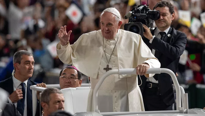 TOKYO, JAPAN - NOVEMBER 25: Pope Francis waves from the Popemobile as he drives around Tokyo Dome before conducting Mass on the third day of his four day visit to Japan, on November 25, 2019 in Tokyo, Japan. Pope Francis has made only the second ever Papal visit to Japan where he visited Nagasaki and Hiroshima before travelling to Tokyo to meet with newly-enthroned Emperor Naruhito and Prime Minister Abe and also hold Mass at Tokyo Dome. (Photo by Carl Court/Getty Images)