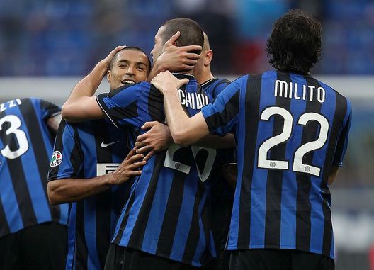 MILAN, ITALY - APRIL 24: Cristian Chivu of Inter celebrates scoring the third goal with team mates, Ivan Ramiro Cordoba and Diego Alberto Milito of Inter during the Serie A match between FC Internazionale Milano and Atalanta BC at Stadio Giuseppe Meazza on April 24, 2010 in Milan, Italy. (Photo by Julian Finney/Getty Images) MILAN, ITALY - APRIL 24: Cristian Chivu of Inter celebrates scoring the third goal with team mates, Ivan Ramiro Cordoba and Diego Alberto Milito of Inter during the Serie A match between FC Internazionale Milano and Atalanta BC at Stadio Giuseppe Meazza on April 24, 2010 in Milan, Italy. (Photo by Julian Finney/Getty Images)