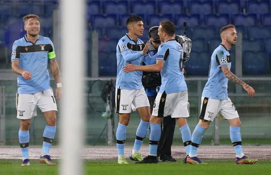 ROME, ITALY - DECEMBER 08: Joaquin Correa of SS Lazio celebrates with teammate Lucas Leiva of SS Lazio after scoring their team's first goal during the UEFA Champions League Group F stage match between SS Lazio and Club Brugge KV at Stadio Olimpico on December 08, 2020 in Rome, Italy. Sporting stadiums around Italy remain under strict restrictions due to the Coronavirus Pandemic as Government social distancing laws prohibit fans inside venues resulting in games being played behind closed doors. (Photo by Paolo Bruno/Getty Images) ROME, ITALY - DECEMBER 08: Joaquin Correa of SS Lazio celebrates with teammate Lucas Leiva of SS Lazio after scoring their team's first goal during the UEFA Champions League Group F stage match between SS Lazio and Club Brugge KV at Stadio Olimpico on December 08, 2020 in Rome, Italy. Sporting stadiums around Italy remain under strict restrictions due to the Coronavirus Pandemic as Government social distancing laws prohibit fans inside venues resulting in games being played behind closed doors. (Photo by Paolo Bruno/Getty Images)