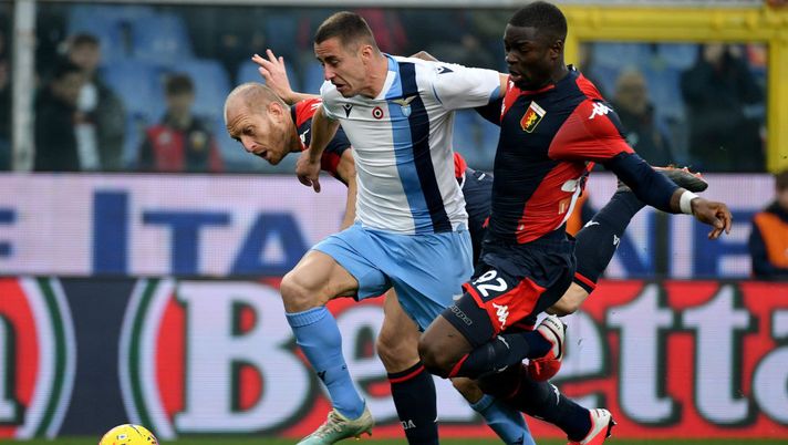 GENOA, ITALY - FEBRUARY 23: Adam Marusic of SS Lazio competes for the ball with Adama Soumaoro and Andrea Masiello of Genoa CFC during the Serie A match between Genoa CFC and SS Lazio at Stadio Luigi Ferraris on February 23, 2020 in Genoa, Italy. (Photo by Marco Rosi/Getty Images) GENOA, ITALY - FEBRUARY 23: Adam Marusic of SS Lazio competes for the ball with Adama Soumaoro and Andrea Masiello of Genoa CFC during the Serie A match between Genoa CFC and SS Lazio at Stadio Luigi Ferraris on February 23, 2020 in Genoa, Italy. (Photo by Marco Rosi/Getty Images)