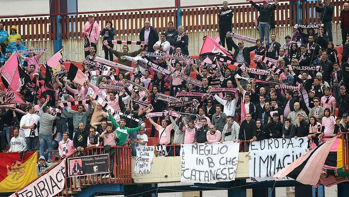 CATANIA, ITALY - APRIL 21: Fans of Palermo during the Serie A match between Calcio Catania and US Citta di Palermo at Stadio Angelo Massimino on April 21, 2013 in Catania, Italy. (Photo by Maurizio Lagana/Getty Images) CATANIA, ITALY - APRIL 21: Fans of Palermo during the Serie A match between Calcio Catania and US Citta di Palermo at Stadio Angelo Massimino on April 21, 2013 in Catania, Italy. (Photo by Maurizio Lagana/Getty Images)