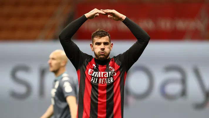 MILAN, ITALY - MAY 01: Theo Hernandez of A.C. Milan celebrates after scoring their side's second goal during the Serie A match between AC Milan and Benevento Calcio at Stadio Giuseppe Meazza on May 01, 2021 in Milan, Italy. Sporting stadiums around Italy remain under strict restrictions due to the Coronavirus Pandemic as Government social distancing laws prohibit fans inside venues resulting in games being played behind closed doors.  (Photo by Marco Luzzani/Getty Images)