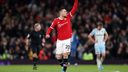 MANCHESTER, ENGLAND - JANUARY 22: Diogo Dalot of Manchester United celebrates at the full time whistle during the Premier League match between Manchester United and West Ham United at Old Trafford on January 22, 2022 in Manchester, England. (Photo by Naomi Baker/Getty Images) MANCHESTER, ENGLAND - JANUARY 22: Diogo Dalot of Manchester United celebrates at the full time whistle during the Premier League match between Manchester United and West Ham United at Old Trafford on January 22, 2022 in Manchester, England. (Photo by Naomi Baker/Getty Images)