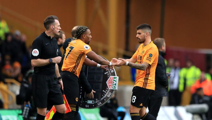 WOLVERHAMPTON, ENGLAND - MARCH 07: Ruben Neves of Wolverhampton Wanderers is substituted for team mate Adama Traore during the Premier League match between Wolverhampton Wanderers and Brighton &amp; Hove Albion at Molineux on March 07, 2020 in Wolverhampton, United Kingdom. (Photo by Matthew Lewis/Getty Images) 