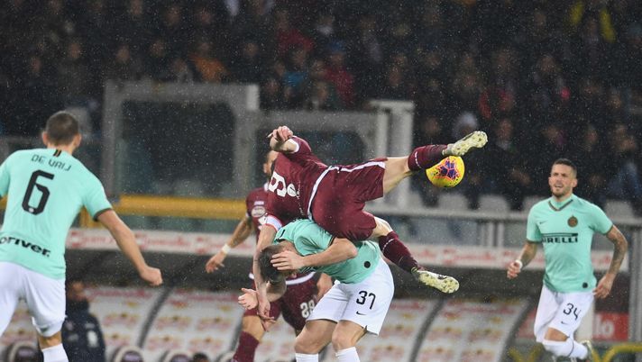 TURIN, ITALY - NOVEMBER 23: Milan Skriniar of FC Internazionale and Andrea Belotti of Torino compete for the ball during the Serie A match between Torino FC and FC Internazionale at Stadio Olimpico di Torino on November 23, 2019 in Turin, Italy. (Photo by Claudio Villa - Inter/Inter via Getty Images ) TURIN, ITALY - NOVEMBER 23: Milan Skriniar of FC Internazionale and Andrea Belotti of Torino compete for the ball during the Serie A match between Torino FC and FC Internazionale at Stadio Olimpico di Torino on November 23, 2019 in Turin, Italy. (Photo by Claudio Villa - Inter/Inter via Getty Images )