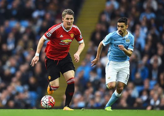 MANCHESTER, ENGLAND - MARCH 20:  Bastian Schweinsteiger of Manchester United is chased by Jesus Navas of Manchester City during the Barclays Premier League match between Manchester City and Manchester United at Etihad Stadium on March 20, 2016 in Manchester, United Kingdom.  (Photo by Laurence Griffiths/Getty Images) 