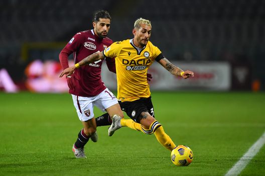 TURIN, ITALY - DECEMBER 12: Roberto Pereyra of Udinese Calcio is put under pressure by Ricardo Rodriguez of Torino F.C. during the Serie A match between Torino FC and Udinese Calcio at Stadio Olimpico di Torino on December 12, 2020 in Turin, Italy. Sporting stadiums around Italy remain under strict restrictions due to the Coronavirus Pandemic as Government social distancing laws prohibit fans inside venues resulting in games being played behind closed doors. (Photo by Valerio Pennicino/Getty Images) TURIN, ITALY - DECEMBER 12: Roberto Pereyra of Udinese Calcio is put under pressure by Ricardo Rodriguez of Torino F.C. during the Serie A match between Torino FC and Udinese Calcio at Stadio Olimpico di Torino on December 12, 2020 in Turin, Italy. Sporting stadiums around Italy remain under strict restrictions due to the Coronavirus Pandemic as Government social distancing laws prohibit fans inside venues resulting in games being played behind closed doors. (Photo by Valerio Pennicino/Getty Images)