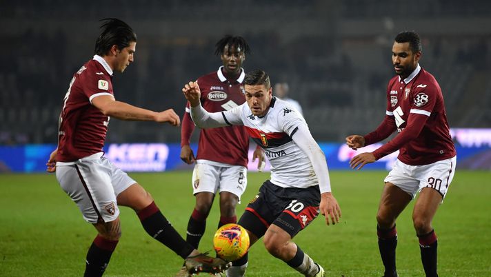 TURIN, ITALY - JANUARY 09:  Kevin Bonifazi (L) of Torino FC is challenged by Andrea Favilli of Genoa CFC during the Coppa Italia match between Torino FC and Genoa CFC at Stadio Olimpico Grande Torino on January 9, 2020 in Turin, Italy.  (Photo by Valerio Pennicino/Getty Images) 