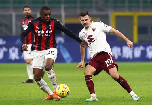 MILAN, ITALY - JANUARY 12: Amer Gojak of Torino F.C. is challenged by Pierre Kalulu of A.C. Milan during the Coppa Italia match between AC Milan and Torino FC at Stadio Giuseppe Meazza on January 12, 2021 in Milan, Italy. Sporting stadiums around Italy remain under strict restrictions due to the Coronavirus Pandemic as Government social distancing laws prohibit fans inside venues resulting in games being played behind closed doors. (Photo by Marco Luzzani/Getty Images) MILAN, ITALY - JANUARY 12: Amer Gojak of Torino F.C. is challenged by Pierre Kalulu of A.C. Milan during the Coppa Italia match between AC Milan and Torino FC at Stadio Giuseppe Meazza on January 12, 2021 in Milan, Italy. Sporting stadiums around Italy remain under strict restrictions due to the Coronavirus Pandemic as Government social distancing laws prohibit fans inside venues resulting in games being played behind closed doors. (Photo by Marco Luzzani/Getty Images)