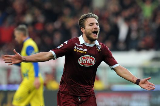  TURIN, ITALY - DECEMBER 22: Ciro Immobile of Torino FC celebrates scoring their second goal during the Serie A match between Torino FC and AC Chievo Verona at Stadio Olimpico di Torino on December 22, 2013 in Turin, Italy. (Photo by Valerio Pennicino/Getty Images) 