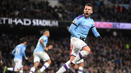 MANCHESTER, ENGLAND - DECEMBER 07: Nicolas Otamendi of Manchester City celebrates after scoring his team's first goal during the Premier League match between Manchester City and Manchester United at Etihad Stadium on December 07, 2019 in Manchester, United Kingdom. (Photo by Michael Regan/Getty Images)