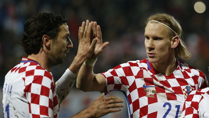 OSIJEK, CROATIA - MARCH 23: Domagoj Vida (R) celebrates with the Dario Srna (L) of Croatia  during the International Friendly match between Croatia and Israel at stadium Gradski Vrt on March 23, 2016 in Osijek, Croatia. (Photo by Srdjan Stevanovic/Getty Images) 