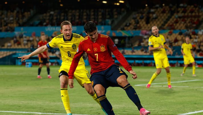 SEVILLE, SPAIN - JUNE 14: Alvaro Morata of Spain fails to keep the ball in play as he is closed down by Ludwig Augustinsson of Sweden during the UEFA Euro 2020 Championship Group E match between Spain and Sweden at the La Cartuja Stadium on June 14, 2021 in Seville, Spain. (Photo by Marcelo Del Pozo - Pool/Getty Images) SEVILLE, SPAIN - JUNE 14: Alvaro Morata of Spain fails to keep the ball in play as he is closed down by Ludwig Augustinsson of Sweden during the UEFA Euro 2020 Championship Group E match between Spain and Sweden at the La Cartuja Stadium on June 14, 2021 in Seville, Spain. (Photo by Marcelo Del Pozo - Pool/Getty Images)