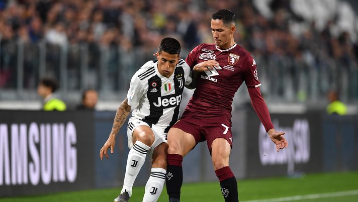 TURIN, ITALY - MAY 03: Joao Cancelo of Juventus competes for the ball with Sasa Lukic of Torino FC  during the Serie A match between Juventus and Torino FC on May 3, 2019 in Turin, Italy.  (Photo by Valerio Pennicino - Juventus FC/Juventus FC via Getty Images)  Torino, Lukic sulla lite Juric-Vagnati: “Non posso commentare, ma il mister è sereno” - immagine 1