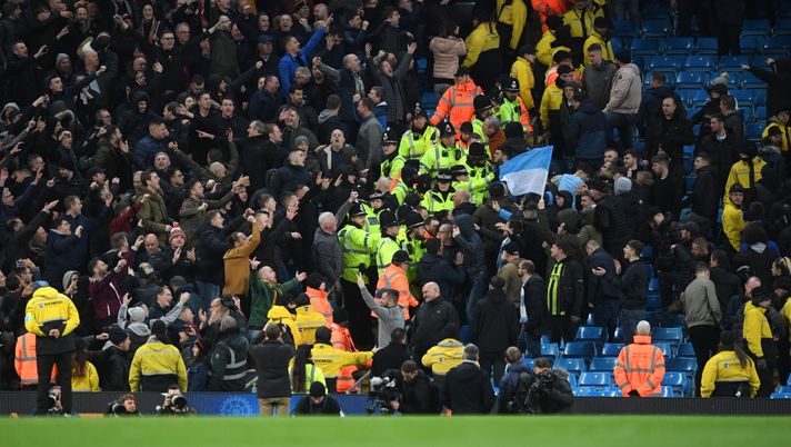 MANCHESTER, ENGLAND - DECEMBER 07: Manchester United fans clash with Manchester City fans following the Premier League match between Manchester City and Manchester United at Etihad Stadium on December 07, 2019 in Manchester, United Kingdom. (Photo by Michael Regan/Getty Images) MANCHESTER, ENGLAND - DECEMBER 07: Manchester United fans clash with Manchester City fans following the Premier League match between Manchester City and Manchester United at Etihad Stadium on December 07, 2019 in Manchester, United Kingdom. (Photo by Michael Regan/Getty Images)