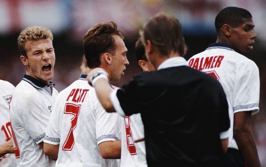 MALMO, SWEDEN - JUNE 14: Alan Shearer (l) reacts as referee Sándor Puhl directs the defensive wall as David Platt (c) and Carlton Palmer (r) look on during the 1992 UEFA European Championship match between England and France on June 14, 1992 in Malmo,Sweden. (Photo by Simon Bruty/Allsport/Getty Images)