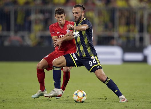  MUNICH, GERMANY - JULY 30: Benjamin Pavard (L) of Muenchen challenges Vedat Muriqi of Fenerbahce during the Audi Cup 2019 semi final match between FC Bayern Muenchen and Fenerbahce at Allianz Arena on July 30, 2019 in Munich, Germany. (Photo by Adam Pretty/Bongarts/Getty Images) 