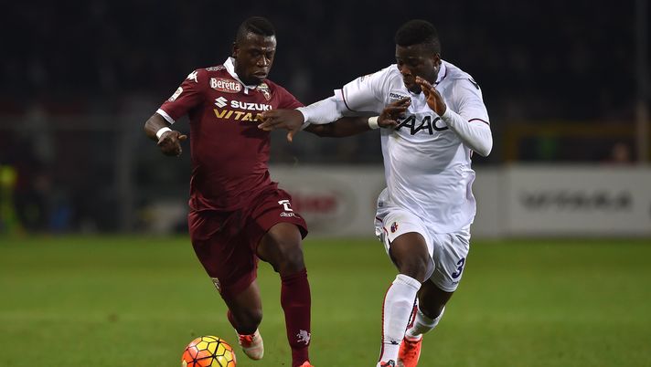 TURIN, ITALY - NOVEMBER 28:  Afriyie Acquah (L) of Torino FC competes with Godfred Donsah of Bologna FC during the Serie A match between Torino FC and Bologna FC  at Stadio Olimpico di Torino on November 28, 2015 in Turin, Italy.  (Photo by Valerio Pennicino/Getty Images)