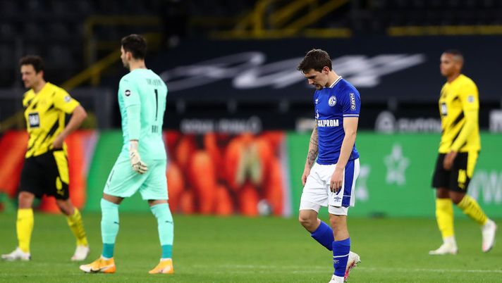 DORTMUND, GERMANY - OCTOBER 24: Benito Raman of FC Schalke 04 reacts after the final whistle during the Bundesliga match between Borussia Dortmund and FC Schalke 04 at Signal Iduna Park on October 24, 2020 in Dortmund, Germany. A limited number of spectators (300) will be in attendance as Covid-19 pandemic restrictions are eased in Dortmund. (Photo by Martin Rose/Getty Images) DORTMUND, GERMANY - OCTOBER 24: Benito Raman of FC Schalke 04 reacts after the final whistle during the Bundesliga match between Borussia Dortmund and FC Schalke 04 at Signal Iduna Park on October 24, 2020 in Dortmund, Germany. A limited number of spectators (300) will be in attendance as Covid-19 pandemic restrictions are eased in Dortmund. (Photo by Martin Rose/Getty Images)