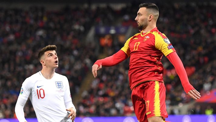 LONDON, ENGLAND - NOVEMBER 14: Sead Haksabanovic of Montenegro takes on Mason Mount of England  during the UEFA Euro 2020 qualifier between England and Montenegro at Wembley Stadium on November 14, 2019 in London, England. (Photo by Michael Regan/Getty Images) 