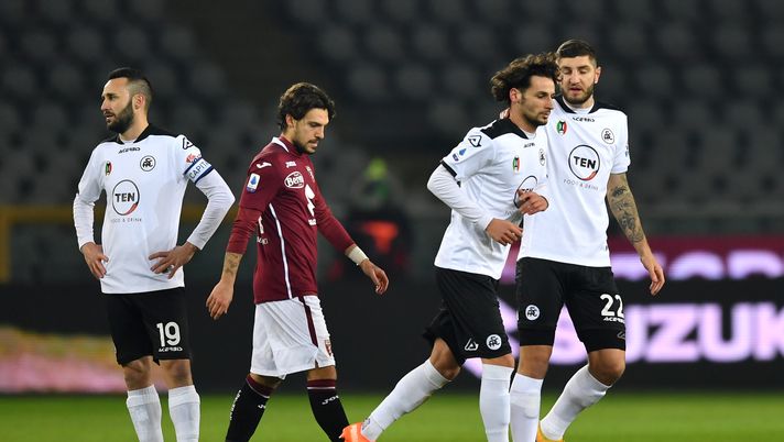 TURIN, ITALY - JANUARY 16: Julian Chabot of Spezia consoles team mate Luca Vignali after he is shown a red card during the Serie A match between Torino FC and Spezia Calcio at Stadio Olimpico di Torino on January 16, 2021 in Turin, Italy. Sporting stadiums around Italy remain under strict restrictions due to the Coronavirus Pandemic as Government social distancing laws prohibit fans inside venues resulting in games being played behind closed doors. (Photo by Valerio Pennicino/Getty Images) TURIN, ITALY - JANUARY 16: Julian Chabot of Spezia consoles team mate Luca Vignali after he is shown a red card during the Serie A match between Torino FC and Spezia Calcio at Stadio Olimpico di Torino on January 16, 2021 in Turin, Italy. Sporting stadiums around Italy remain under strict restrictions due to the Coronavirus Pandemic as Government social distancing laws prohibit fans inside venues resulting in games being played behind closed doors. (Photo by Valerio Pennicino/Getty Images)