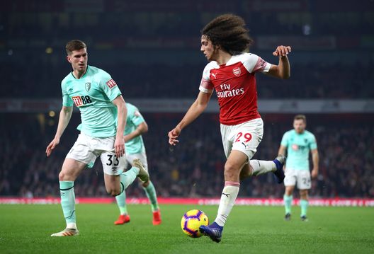 LONDON, ENGLAND - FEBRUARY 27: Matteo Guendouzi of Arsenal is challenged by Chris Mepham of AFC Bournemouth during the Premier League match between Arsenal FC and AFC Bournemouth at Emirates Stadium on February 27, 2019 in London, United Kingdom. (Photo by Julian Finney/Getty Images) LONDON, ENGLAND - FEBRUARY 27: Matteo Guendouzi of Arsenal is challenged by Chris Mepham of AFC Bournemouth during the Premier League match between Arsenal FC and AFC Bournemouth at Emirates Stadium on February 27, 2019 in London, United Kingdom. (Photo by Julian Finney/Getty Images)