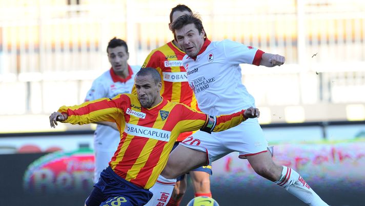 LECCE, ITALY - JANUARY 06:  Guillermo Giacomazzi of Lecce and Vitali Kutuzov of Bari  in action during the Serie A match between Lecce and Bari at Stadio Via del Mare on January 6, 2011 in Lecce, Italy.  (Photo by Giuseppe Bellini/Getty Images)  Bari