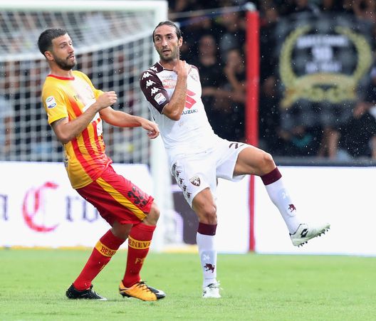 BENEVENTO, ITALY - SEPTEMBER 10: Massimo Coda (L) of Benevento competes for the ball with Emiiano Moretti of Torino during the Serie A match between Benevento Calcio and Torino FC at Stadio Ciro Vigorito on September 10, 2017 in Benevento, Italy. (Photo by Maurizio Lagana/Getty Images) BENEVENTO, ITALY - SEPTEMBER 10: Massimo Coda (L) of Benevento competes for the ball with Emiiano Moretti of Torino during the Serie A match between Benevento Calcio and Torino FC at Stadio Ciro Vigorito on September 10, 2017 in Benevento, Italy. (Photo by Maurizio Lagana/Getty Images)