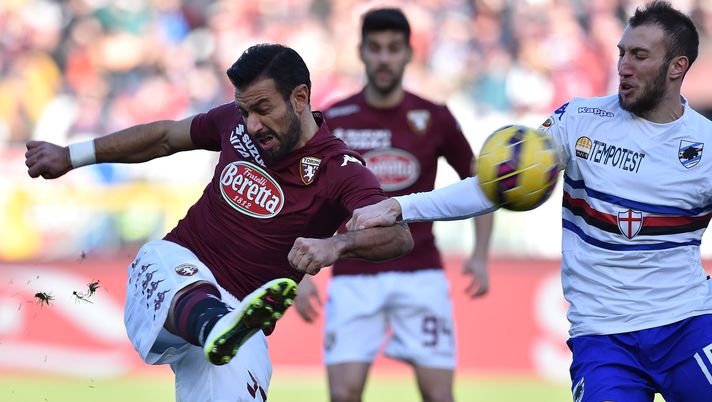 TURIN, ITALY - FEBRUARY 01:  Fabio Quagliarella (L) of Torino FC is challenged by Vasco Regini of UC Sampdoria during the Serie A match between Torino FC and UC Sampdoria at Stadio Olimpico di Torino on February 1, 2015 in Turin, Italy.  (Photo by Valerio Pennicino/Getty Images) 