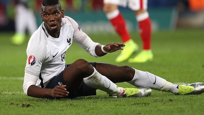 LILLE, FRANCE - JUNE 19:  Paul Pogba of France reacts during the UEFA EURO 2016 Group A match between Switzerland and France at Stade Pierre-Mauroy on June 19, 2016 in Lille, France.  (Photo by Matthew Ashton - AMA/Getty Images)  LILLE, FRANCE - JUNE 19:  Paul Pogba of France reacts during the UEFA EURO 2016 Group A match between Switzerland and France at Stade Pierre-Mauroy on June 19, 2016 in Lille, France.  (Photo by Matthew Ashton - AMA/Getty Images)