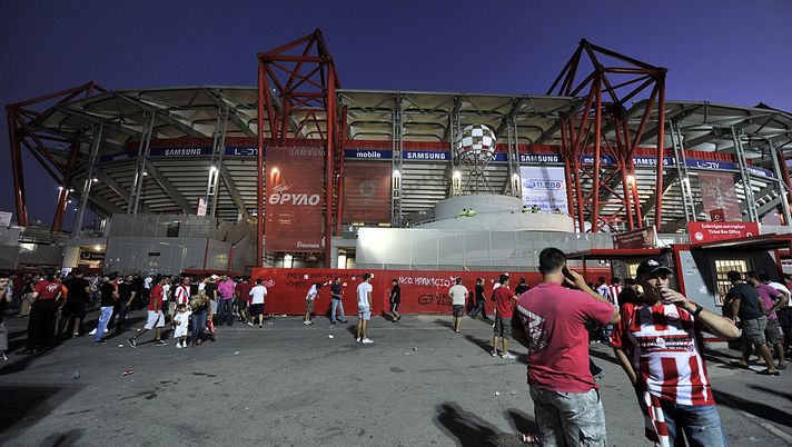 PIRAEUS, GREECE - SEPTEMBER 18: Olympiacos FC fans seen outside the Karaiskakis Stadium, home of Olympiacos FC prior to the Greek Super League match between Olympiacos FC and Xanthi FC at the Karaiskakis Stadium on September 18, 2011 in Piraeus, Greece. (Photo by Louisa Gouliamaki/EuroFootball/Getty Images) PIRAEUS, GREECE - SEPTEMBER 18: Olympiacos FC fans seen outside the Karaiskakis Stadium, home of Olympiacos FC prior to the Greek Super League match between Olympiacos FC and Xanthi FC at the Karaiskakis Stadium on September 18, 2011 in Piraeus, Greece. (Photo by Louisa Gouliamaki/EuroFootball/Getty Images)