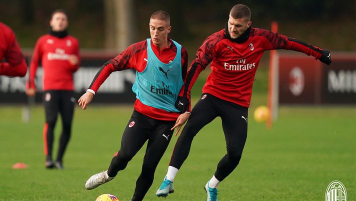Andrea Conti ed Ante Rebic in allenamento con il Milan a Milanello (credits: acmilan.com) 