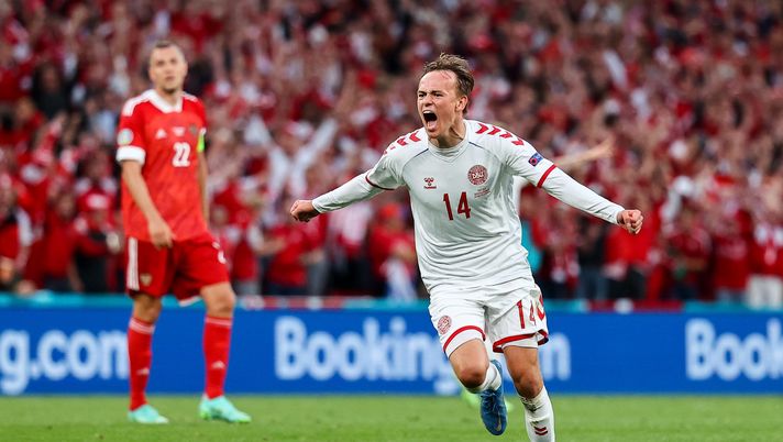 COPENHAGEN, DENMARK - JUNE 21: Mikkel Damsgaard of Denmark celebrates after scoring their side's first goal during the UEFA Euro 2020 Championship Group B match between Russia and Denmark at Parken Stadium on June 21, 2021 in Copenhagen, Denmark. (Photo by Wolfgang Rattay - Pool/Getty Images) COPENHAGEN, DENMARK - JUNE 21: Mikkel Damsgaard of Denmark celebrates after scoring their side's first goal during the UEFA Euro 2020 Championship Group B match between Russia and Denmark at Parken Stadium on June 21, 2021 in Copenhagen, Denmark. (Photo by Wolfgang Rattay - Pool/Getty Images)