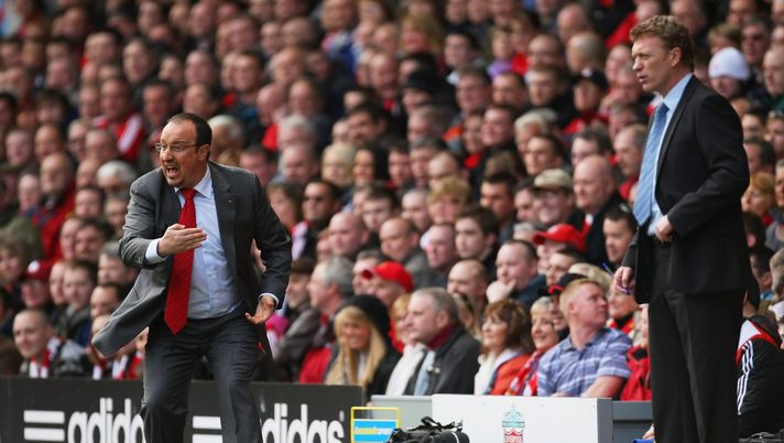LIVERPOOL, UNITED KINGDOM - MARCH 30: Rafael Benitez (L), the Liverpool manager shouts to his players as David Moyes, the Everton manager looks on during the Barclays Premier League match between Liverpool and Everton at Anfield on March 30, 2008 in Liverpool, England. (Photo by Richard Heathcote/Getty Images) LIVERPOOL, UNITED KINGDOM - MARCH 30: Rafael Benitez (L), the Liverpool manager shouts to his players as David Moyes, the Everton manager looks on during the Barclays Premier League match between Liverpool and Everton at Anfield on March 30, 2008 in Liverpool, England. (Photo by Richard Heathcote/Getty Images)