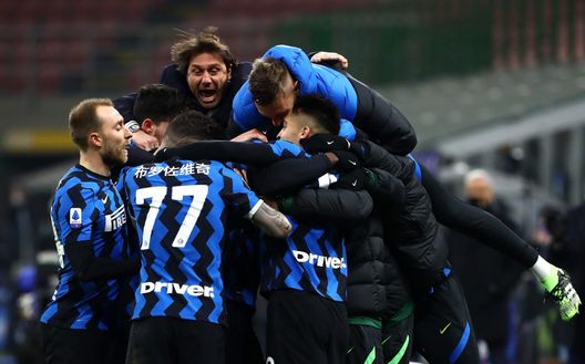 MILAN, ITALY - FEBRUARY 14: Lautaro Martinez of FC Internazionale celebrates with team mates and Antonio Conte, Head Coach of FC Internazionale after scoring their side's third goal during the Serie A match between FC Internazionale and SS Lazio at Stadio Giuseppe Meazza on February 14, 2021 in Milan, Italy. Sporting stadiums around Italy remain under strict restrictions due to the Coronavirus Pandemic as Government social distancing laws prohibit fans inside venues resulting in games being played behind closed doors. (Photo by Marco Luzzani/Getty Images) MILAN, ITALY - FEBRUARY 14: Lautaro Martinez of FC Internazionale celebrates with team mates and Antonio Conte, Head Coach of FC Internazionale after scoring their side's third goal during the Serie A match between FC Internazionale and SS Lazio at Stadio Giuseppe Meazza on February 14, 2021 in Milan, Italy. Sporting stadiums around Italy remain under strict restrictions due to the Coronavirus Pandemic as Government social distancing laws prohibit fans inside venues resulting in games being played behind closed doors. (Photo by Marco Luzzani/Getty Images)