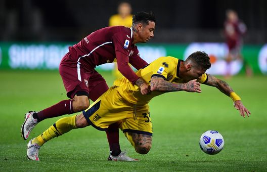 TURIN, ITALY - MAY 03: Juraj Kucka of Parma Calcio 1913 is challenged by Armando Izzo of Torino FC during the Serie A match between Torino FC and Parma Calcio at Stadio Olimpico di Torino on May 03, 2021 in Turin, Italy. Sporting stadiums around Italy remain under strict restrictions due to the Coronavirus Pandemic as Government social distancing laws prohibit fans inside venues resulting in games being played behind closed doors. (Photo by Valerio Pennicino/Getty Images) TURIN, ITALY - MAY 03: Juraj Kucka of Parma Calcio 1913 is challenged by Armando Izzo of Torino FC during the Serie A match between Torino FC and Parma Calcio at Stadio Olimpico di Torino on May 03, 2021 in Turin, Italy. Sporting stadiums around Italy remain under strict restrictions due to the Coronavirus Pandemic as Government social distancing laws prohibit fans inside venues resulting in games being played behind closed doors. (Photo by Valerio Pennicino/Getty Images)