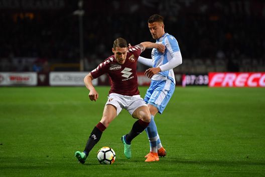  TURIN, ITALY - APRIL 29: Andrea Belotti (L) of Torino FC is challenged by Sergej Milinkovic-Savic of SS Lazio during the Serie A match between Torino FC and SS Lazio at Stadio Olimpico di Torino on April 29, 2018 in Turin, Italy. (Photo by Valerio Pennicino/Getty Images) 