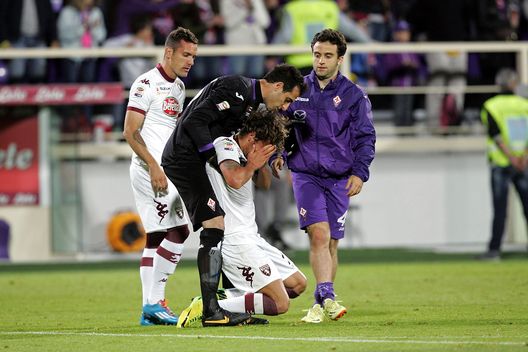  FLORENCE, ITALY - MAY 18: Alessio Cerci (C) of Torino FC shows his dejection during the Serie A match between ACF Fiorentina and Torino FC at Stadio Artemio Franchi on May 18, 2014 in Florence, Italy. (Photo by Gabriele Maltinti/Getty Images) 